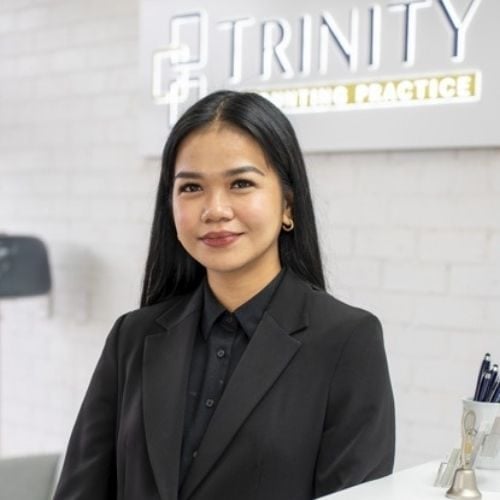 Tax advisor in professional attire at Trinity Accounting Practice, a trusted Australian firm specialising in tax returns, BAS/IAS, SMSF, business advisory, and Virtual CFO services.
