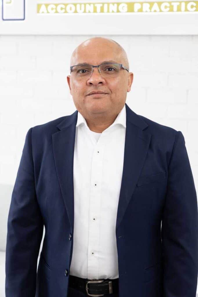 Professional male accountant in formal attire at Trinity Accounting Practice, providing tax and business advisory services in Beverly Hills, NSW.