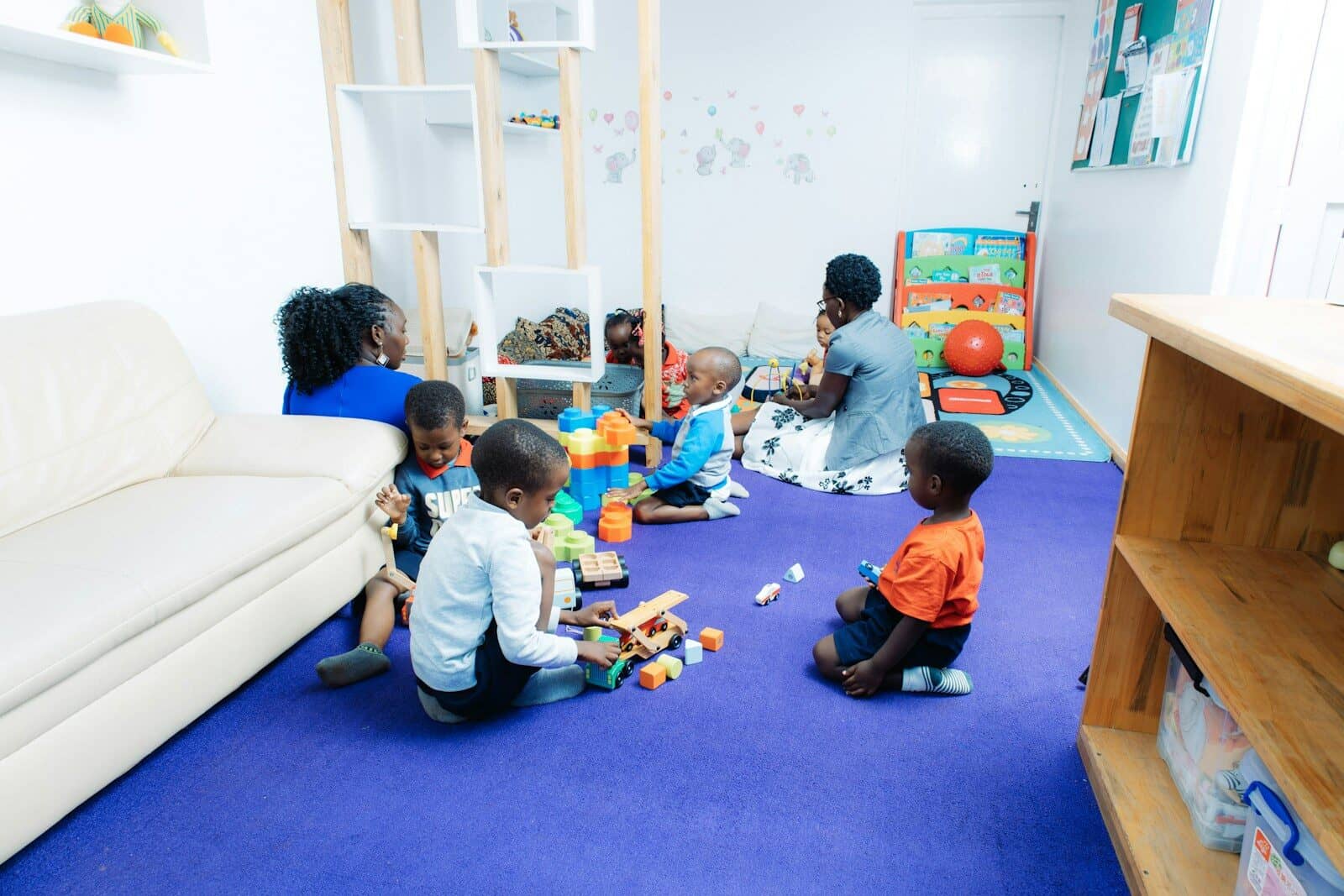 Children playing in a childcare centre room, representing accountants for childcare businesses in Sydney