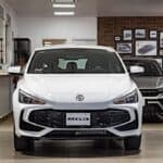 New car in a dealership showroom, representing buying a car through your business in Australia