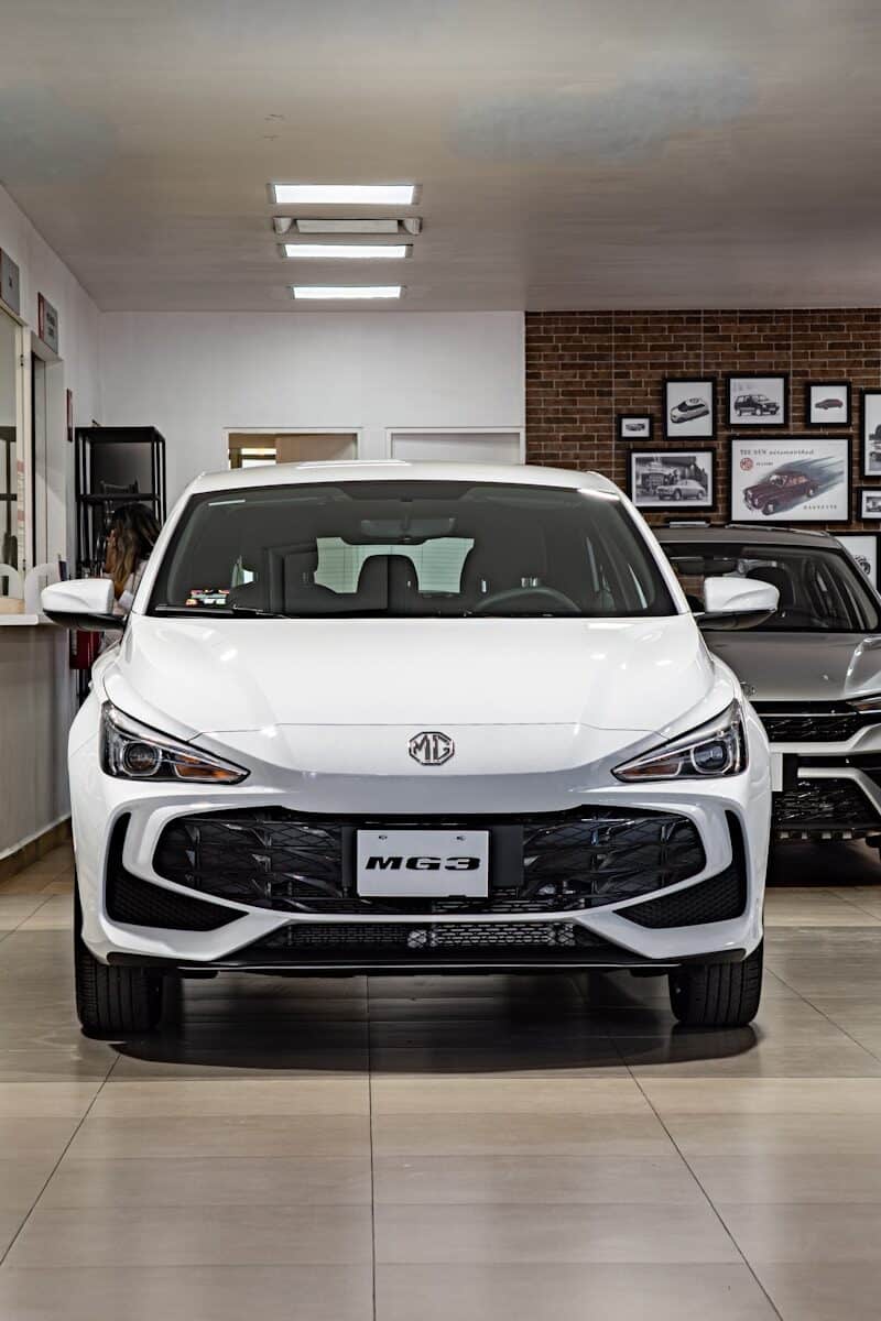 New car in a dealership showroom, representing buying a car through your business in Australia