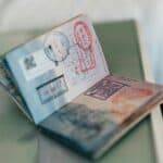Passport with travel stamps, representing the tests for being an Australian resident for tax purposes